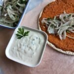 Traditional Turkish Pizza (Lahmacun) With Onion Salad and Garlic Sauce